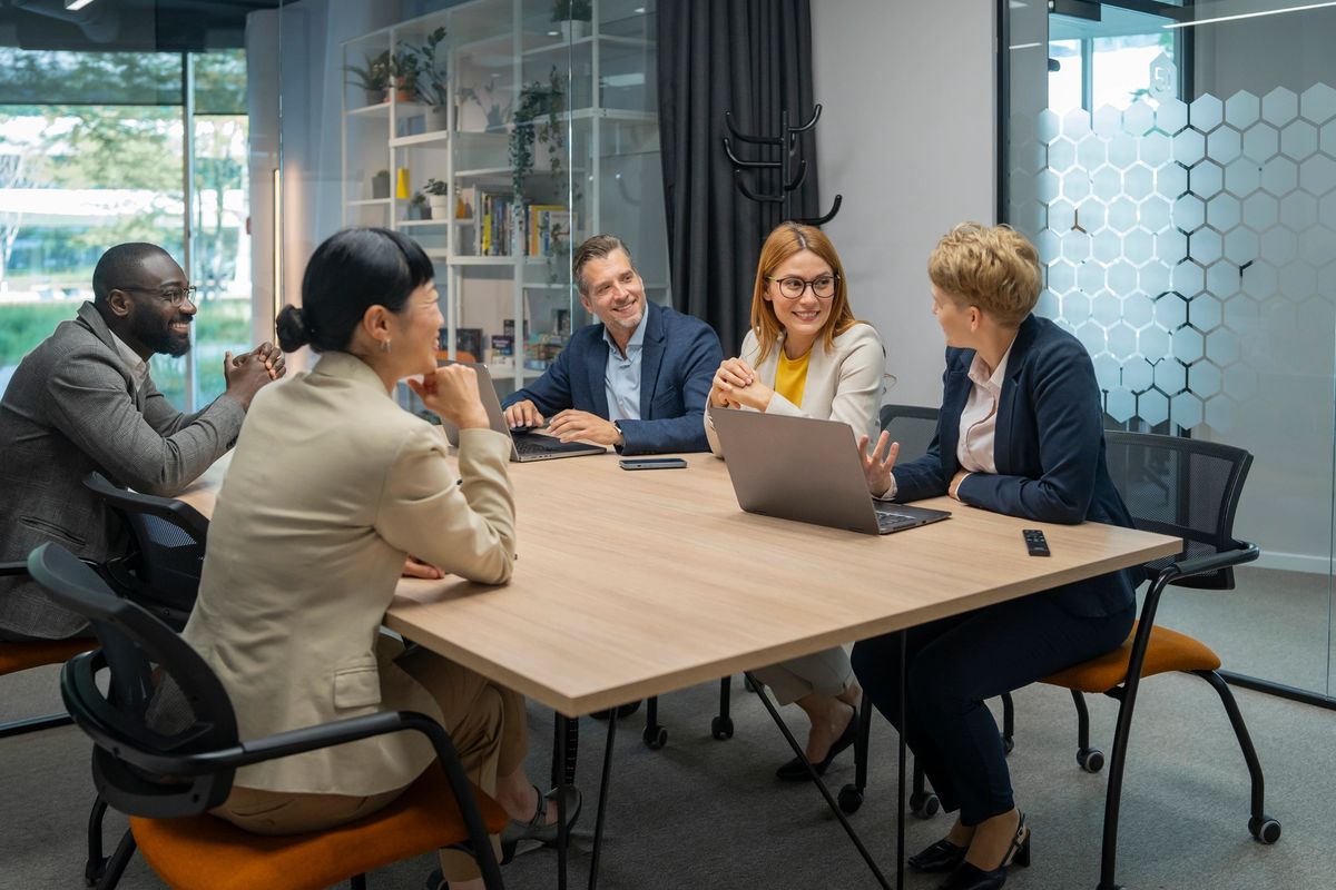 Business owners meeting around a conference table